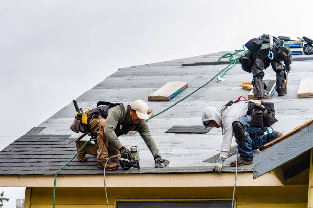 Professional Roofing technician working in New London, CT